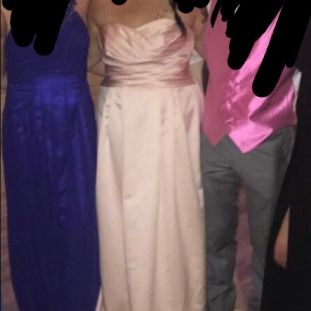 Light pink David’s bridal gown
Worn once